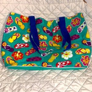 Beach tote bags with flip-flops and flowers on it